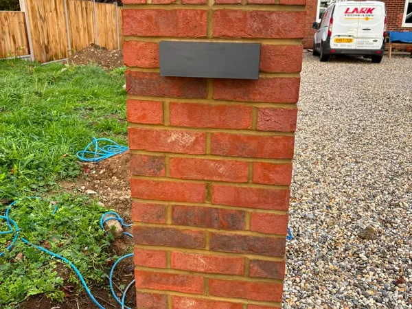 Exterior lighting installation on a residential property